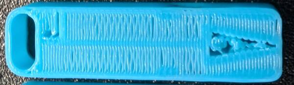 Whistle bridge layer, with wavy and gappy bridge lines that are well melded with the outer wall